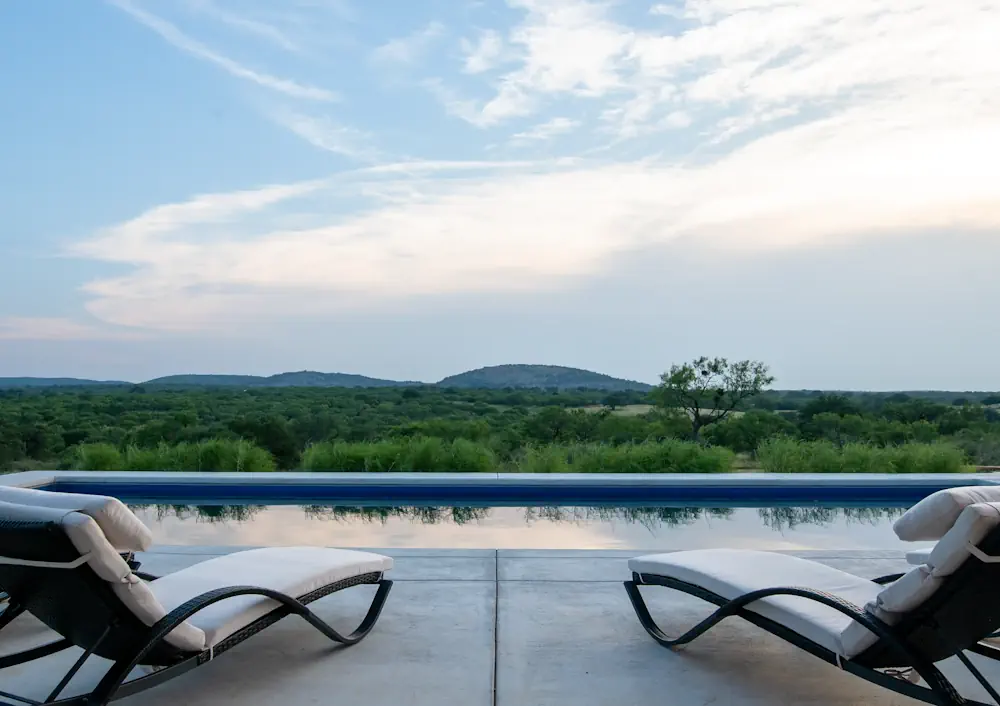 This fiberglass pool from Aviva Pools is a magnificent addition to this ranch in Llano, Texas