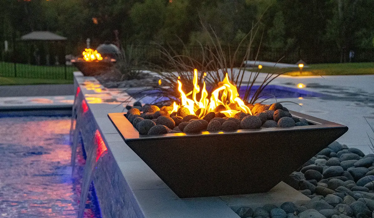 Enhance Your Fiberglass Pool with Captivating Fire Features