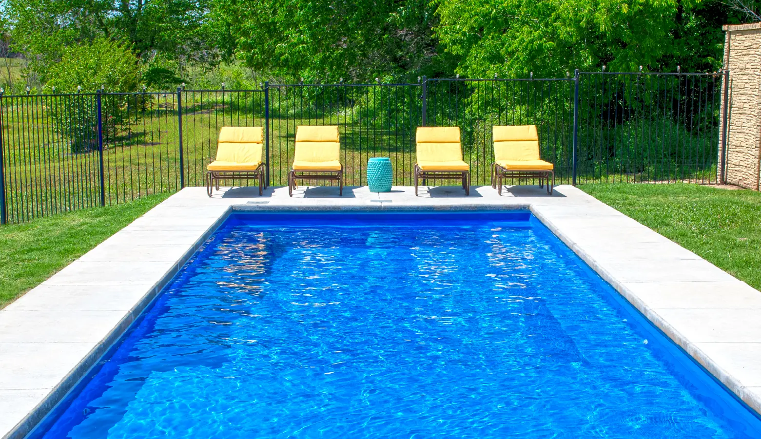 The Ovation fiberglass pool model: subtle sophistication for your backyard oasis