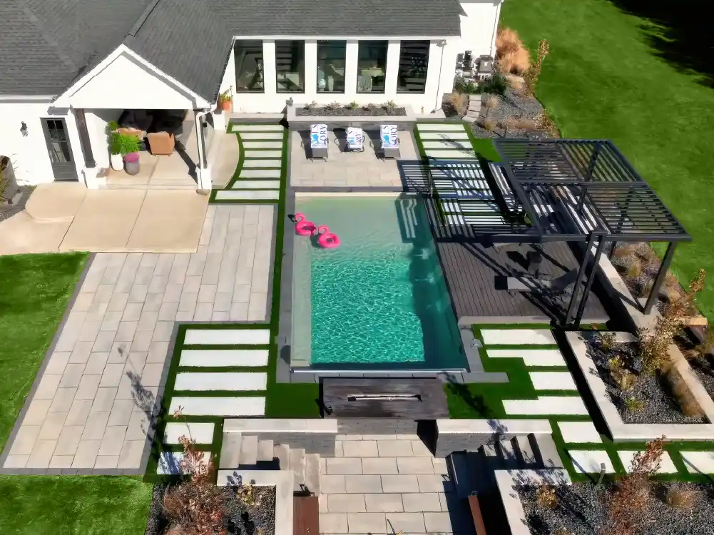 052925-POTMMarch-2TheFoundation The Apex 30 backyard pool in Diamond Sand color